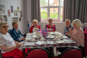 image of afternoon tea attendees